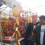 Firecracker decorations and New Year couplets mean good luck and joy. Photo: Jian Di Liang. Oakland Voices, 2012.