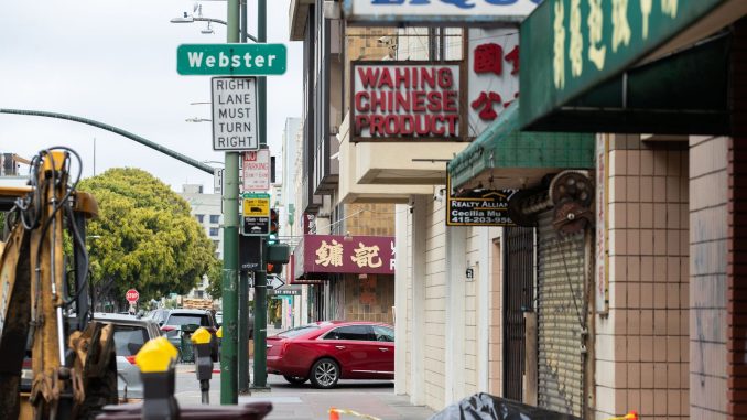 A Chinatown street corner that says "Webster"