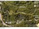 An aerial map of green hills and boundaries of about 5 acres