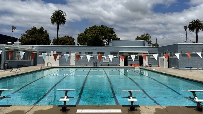 a nice swimming pool with lap lanes on a sunny day