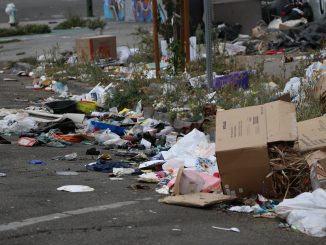 Trash piled on the street